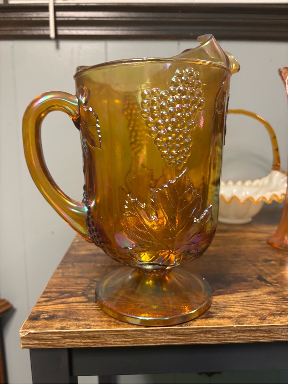 Carnival Indian Glass Grape & Leaf Footed Pitcher — Iridescent Amber